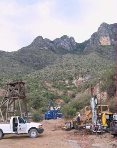Surface drill rig and headframe in mountainous terrain in Mexico, 2017